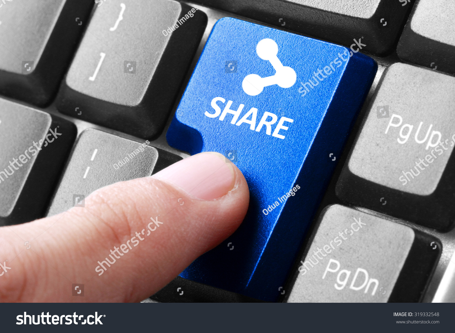 Sharing file. gesture of finger pressing share button on a computer keyboard #319332548