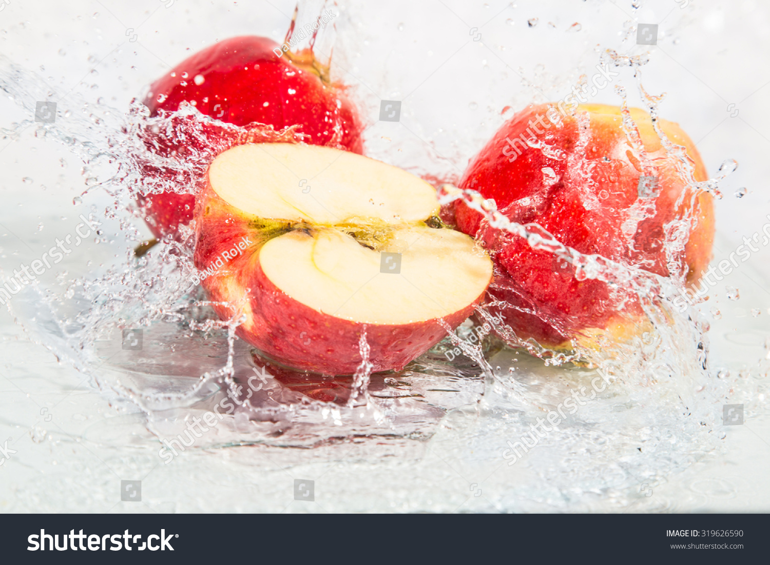 Fresh apples with splashing water. #319626590