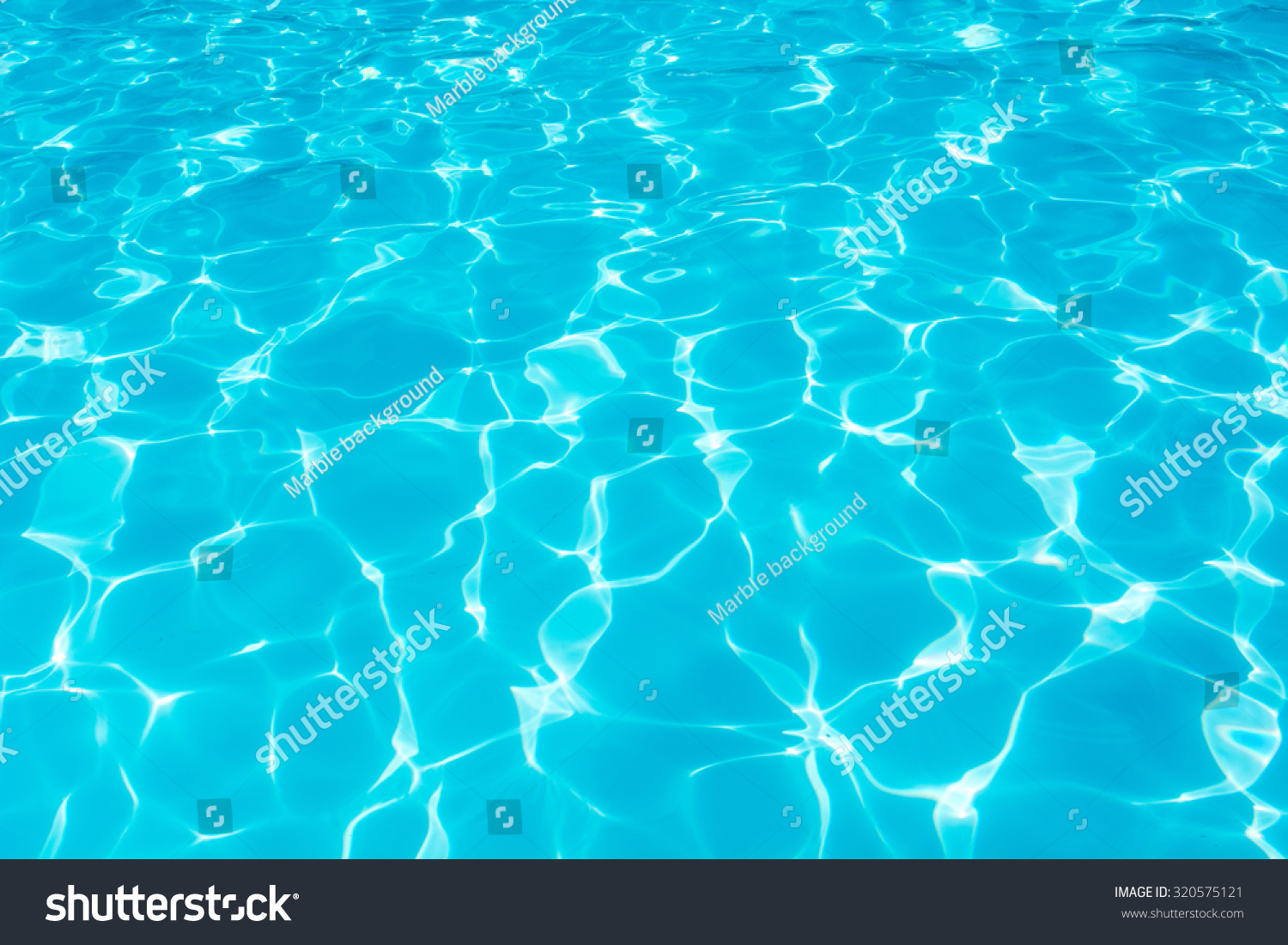 Swimming pool blue water reflecting the sun rippled details. #320575121