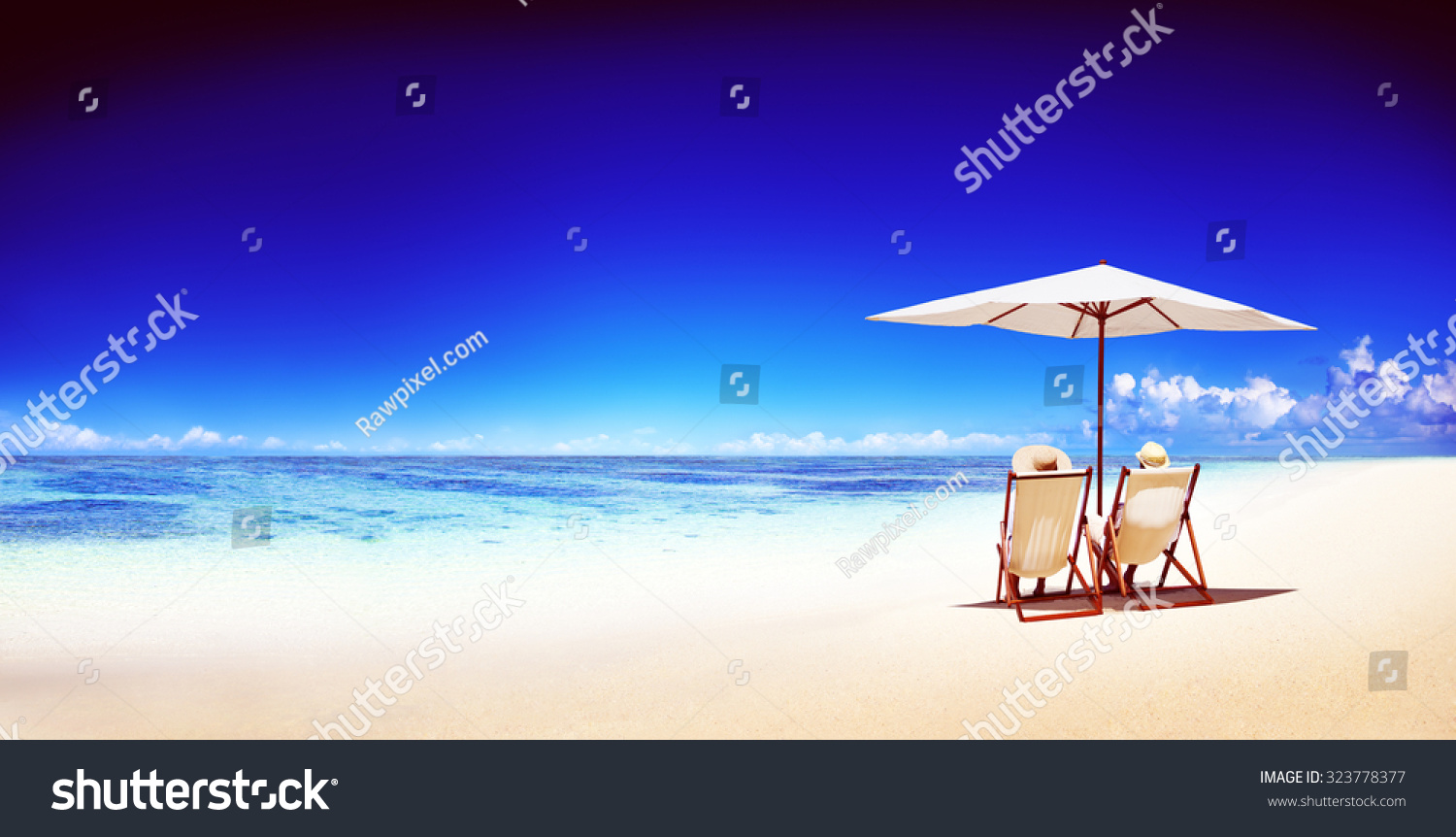 Couple Relaxing Tropical Beach Ocean Summer Travel Concept #323778377