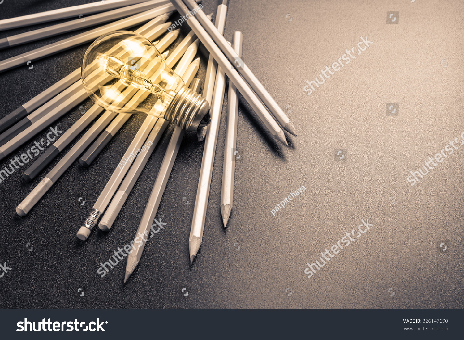 Light bulb with many pencils #326147690