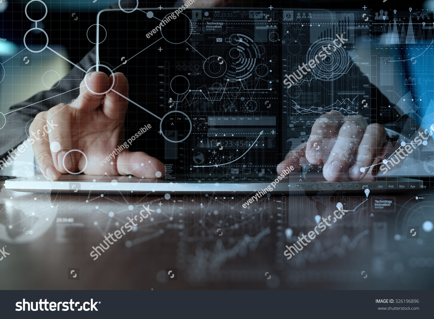 businessman hand working on laptop computer with digital layer business strategy and social media diagram on wooden desk   #326196896