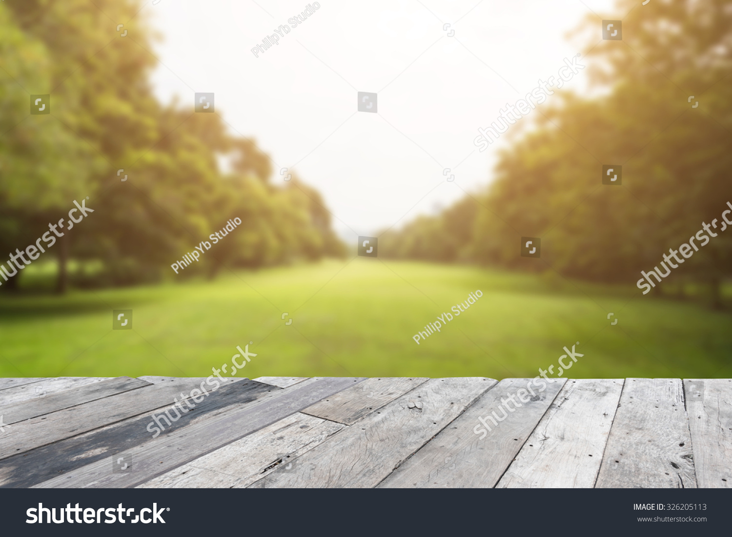 Wood floor top on blurred city park background #326205113