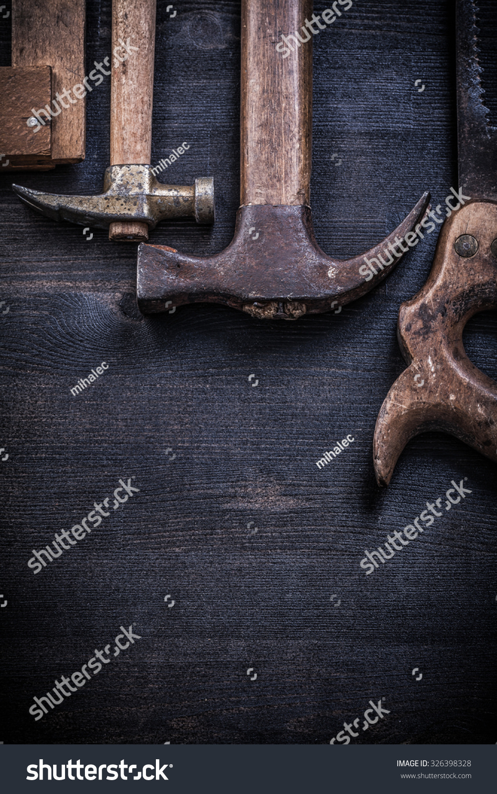 Composition of vintage rusted construction tools on wooden board. #326398328