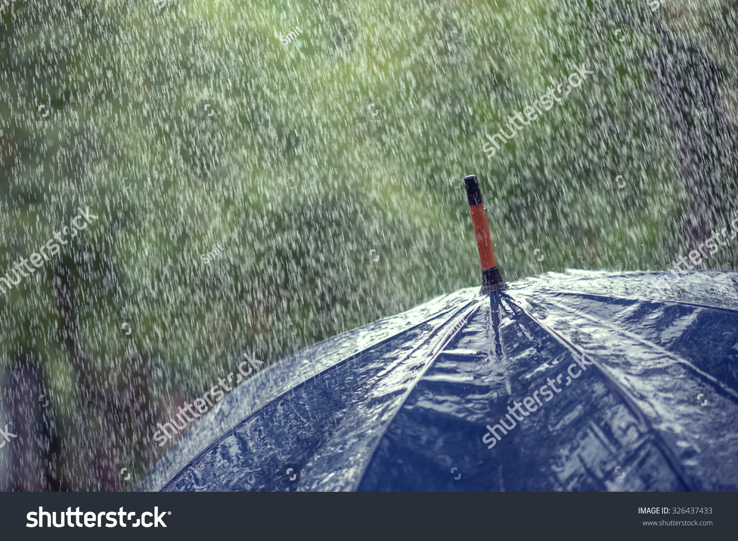 umbrella and rain drops closeup #326437433