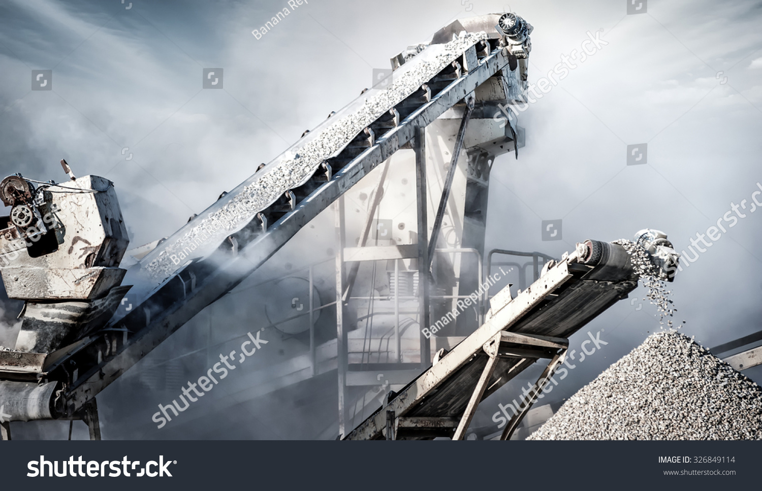 Cement production factory on mining quarry. Conveyor belt of heavy machinery loads stones and gravel  #326849114