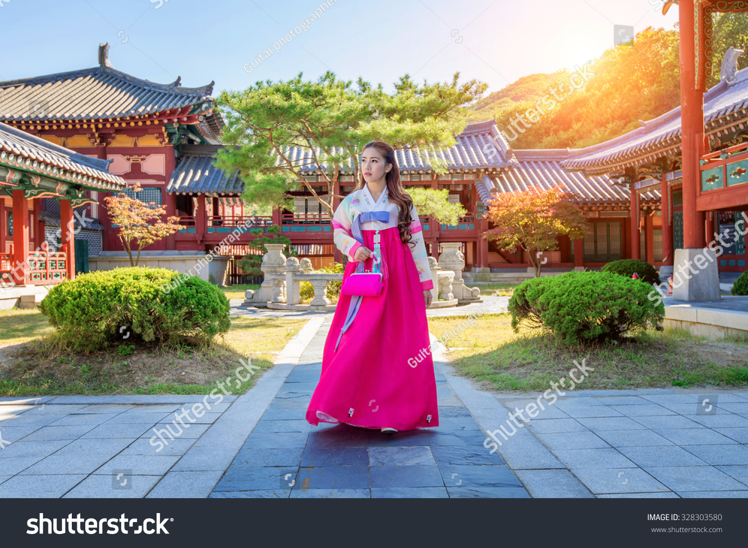 Woman with Hanbok in Gyeongbokgung,the traditional Korean dress. #328303580