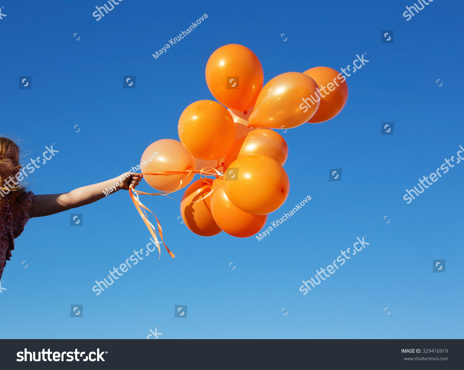little girl outdoors with balloons #329416919