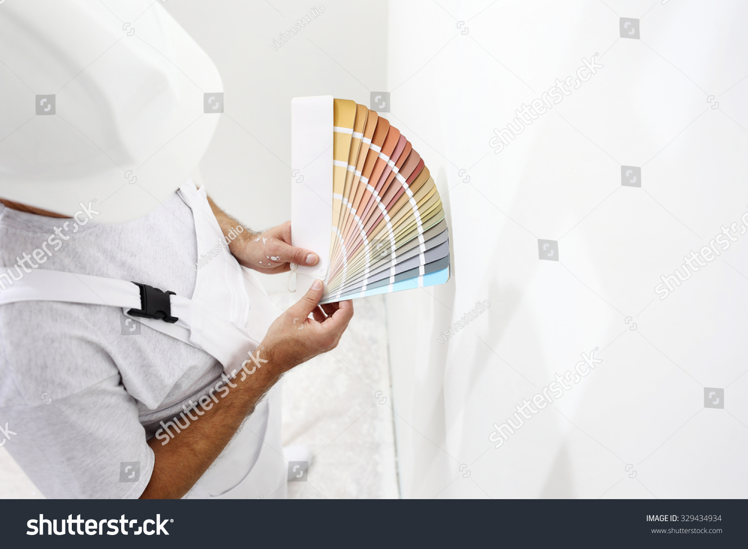 painter man with color swatches in your hand  #329434934