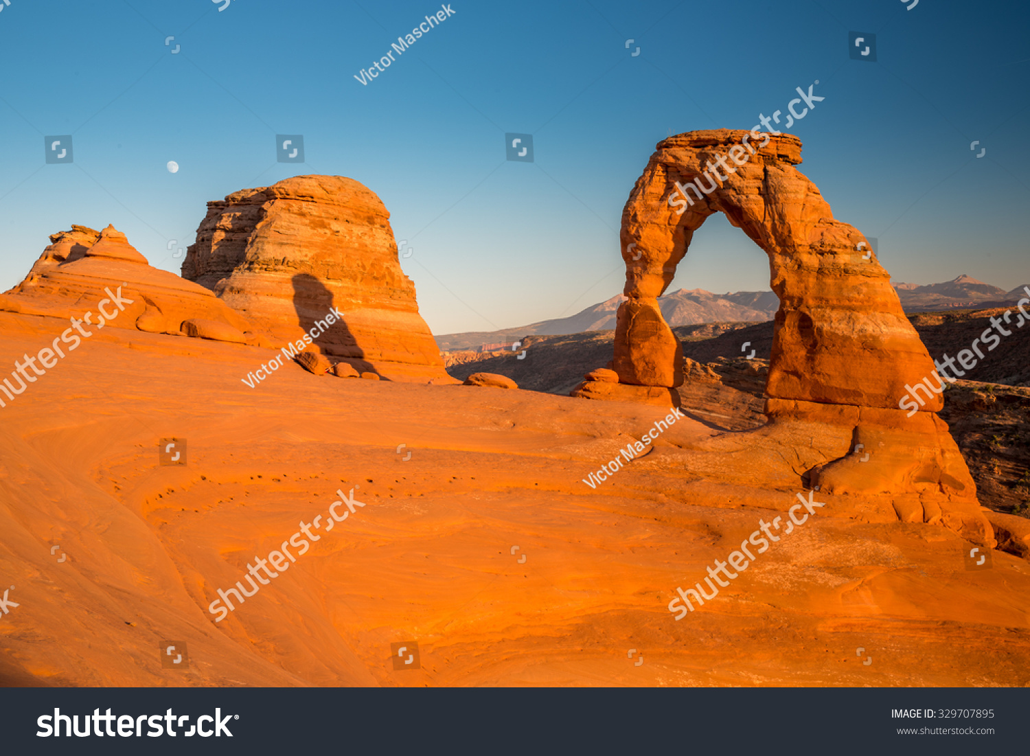 View of the famous Delicate Arch at sunset in Utah, USA. #329707895