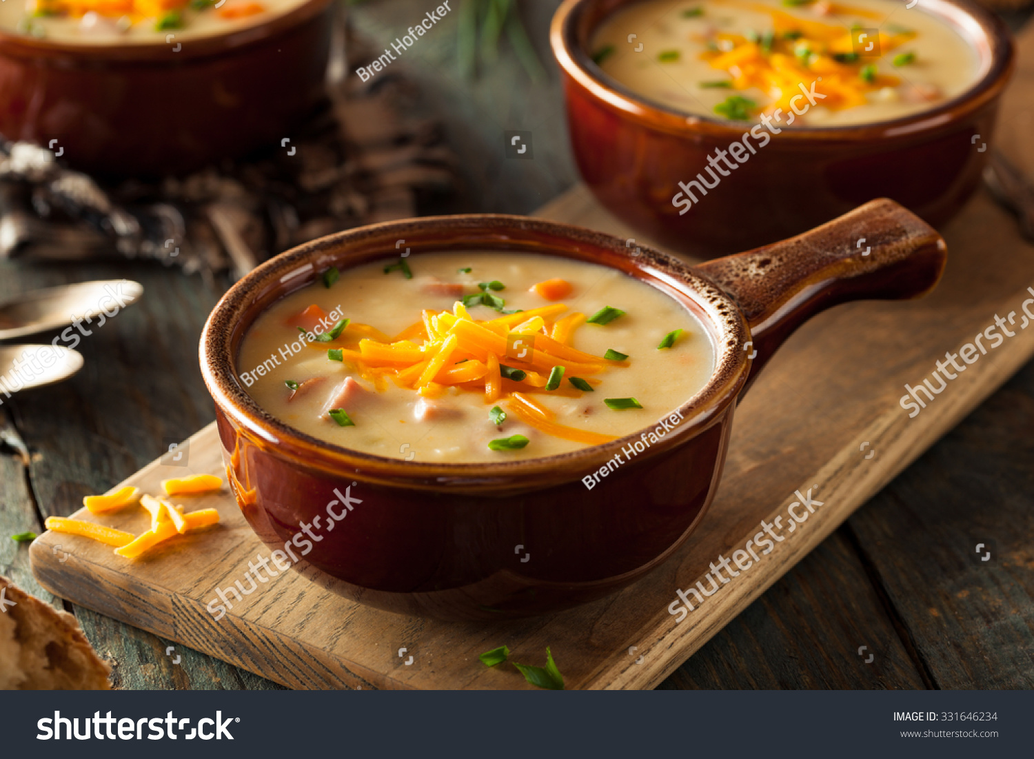 Homemade Beer Cheese Soup with Chives and Bread #331646234