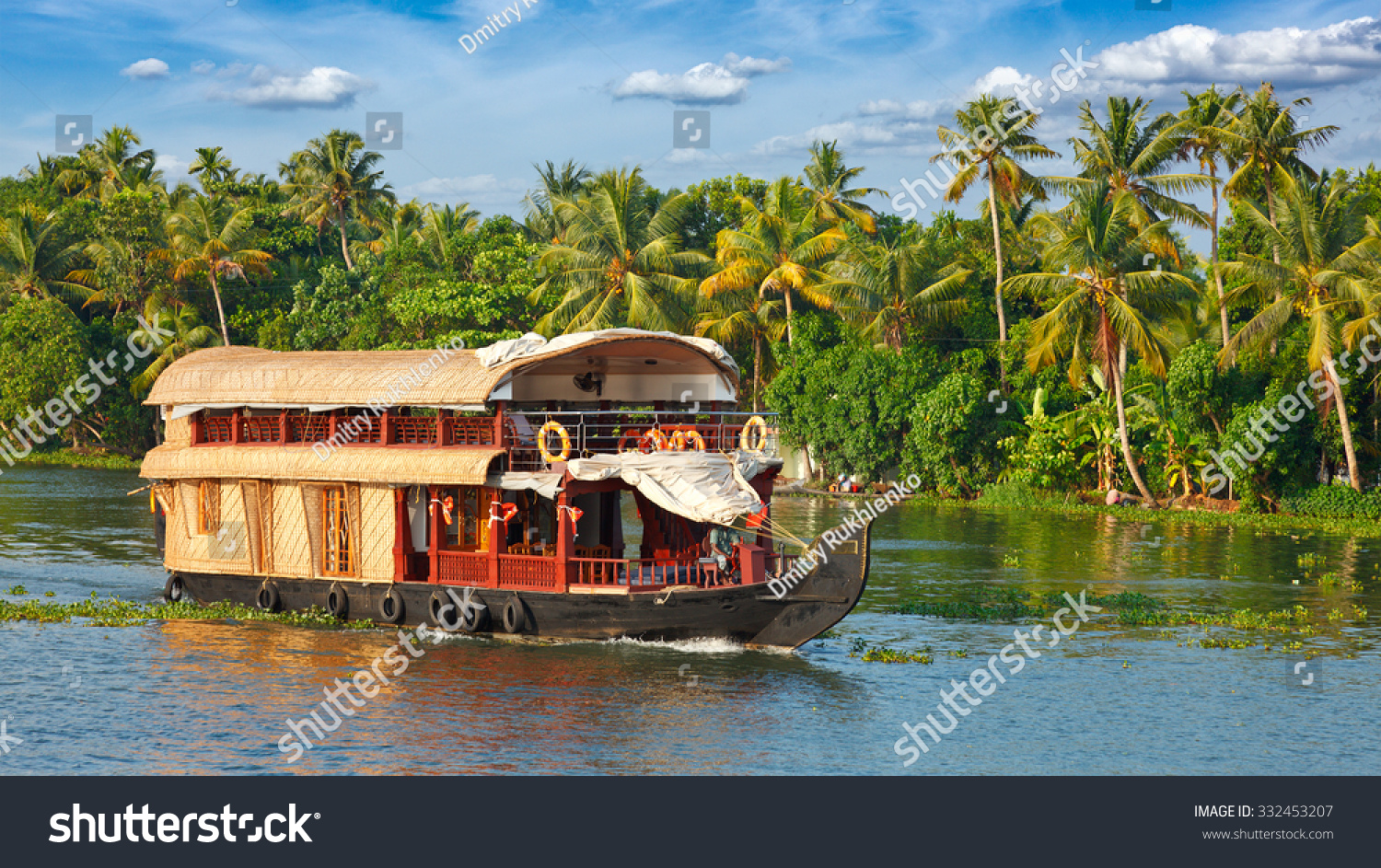 Panorama of tourist houseboat on Kerala backwaters. Kerala, India #332453207