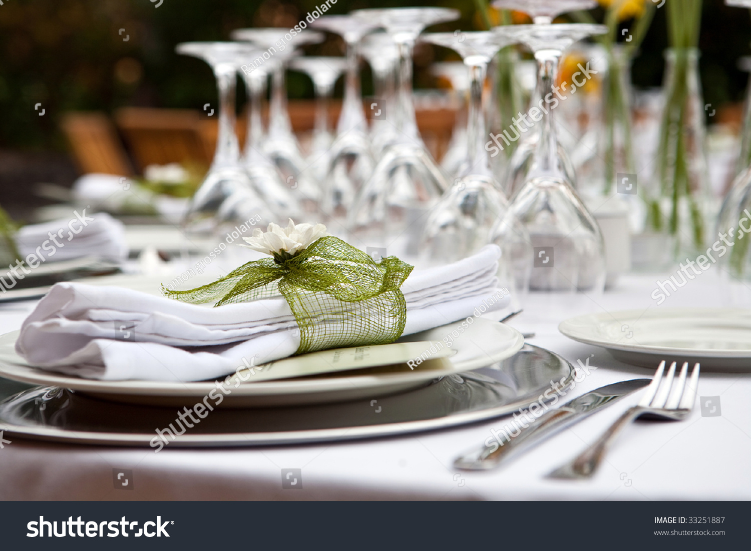 Table setting for a wedding or dinner event with flowers #33251887