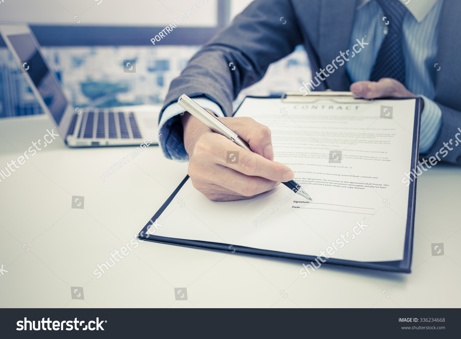 Business man signing a contract #336234668