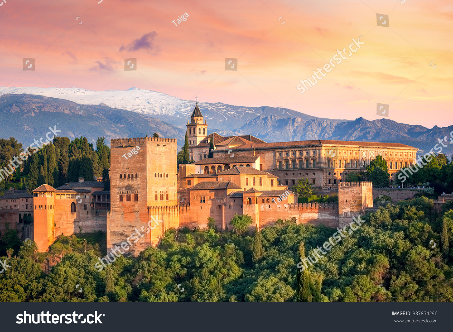 Ancient arabic fortress Alhambra at the beautiful evening time, Granada, Spain, European travel landmark #337854296