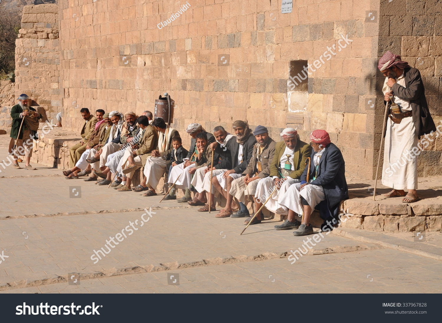 Thula, Yemen - Dec 29: Men sit on the main square of Thula on December, 29, 2009. Thula, Yemen #337967828