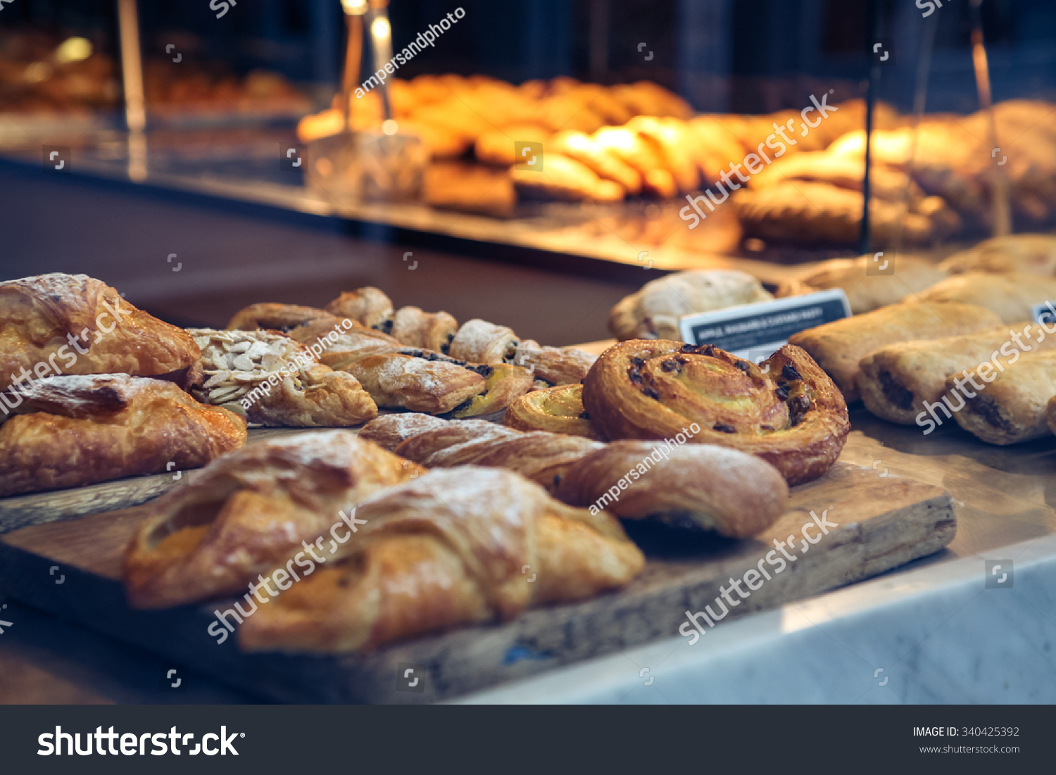 Pastries in a bakery window #340425392