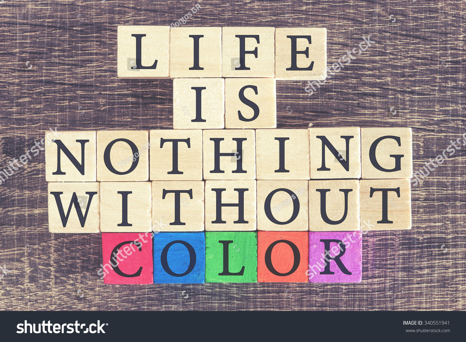 Color quote background Life Is Nothing Without Color message written with colorful wooden blocks