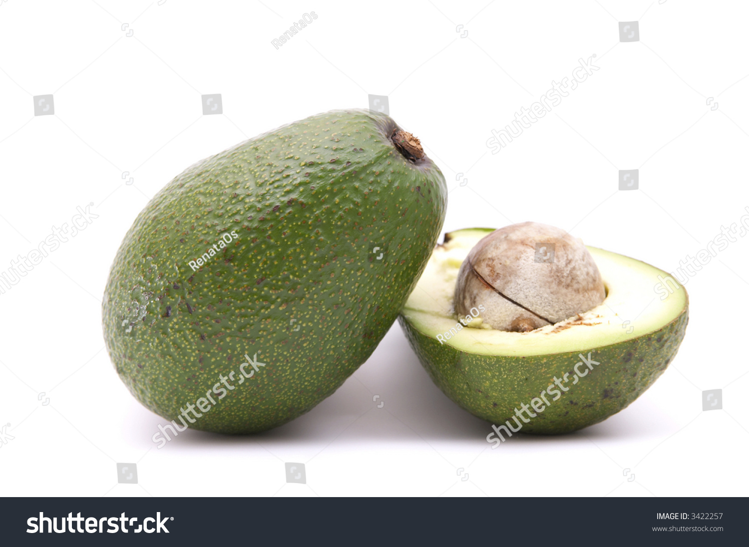 fresh, green avocado cut by half isolated on white #3422257