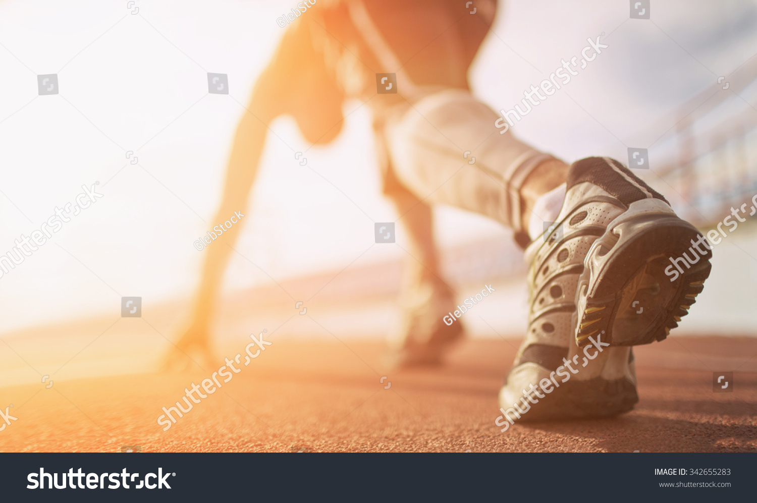 Athlete runner feet running on treadmill closeup on shoe #342655283