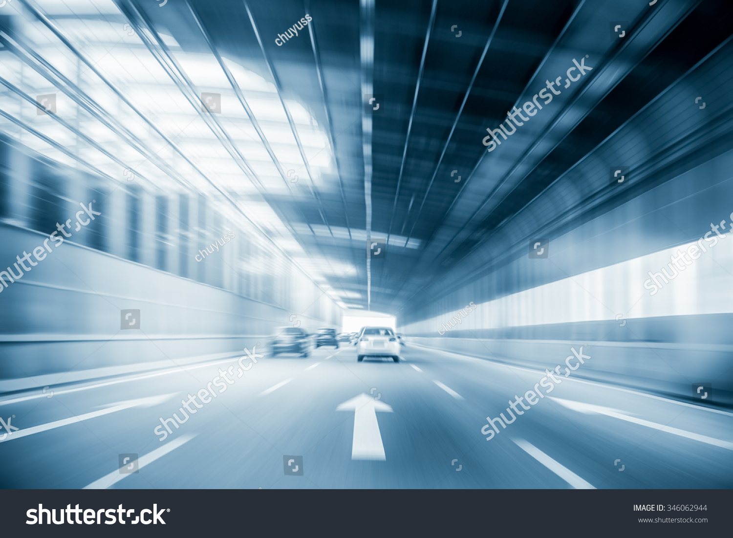 city expressway traffic with cars motion blur in a steel structure of sound insulation construction #346062944