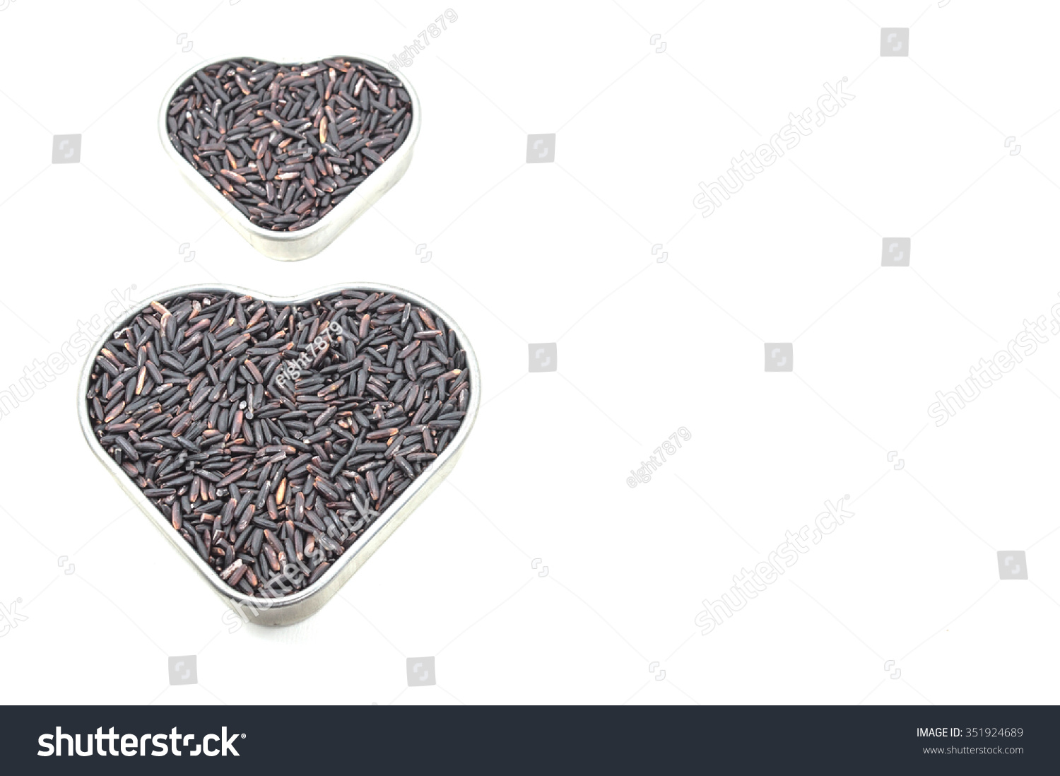 Rice berry in the heart box on the white background #351924689
