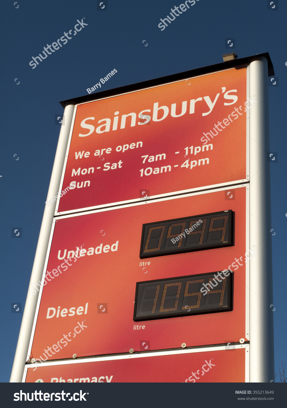 Newbury, Hectors Way, Berkshire, England - December 23, 2015: Sainsburys supermarket petrol and diesel prices sign #355213649
