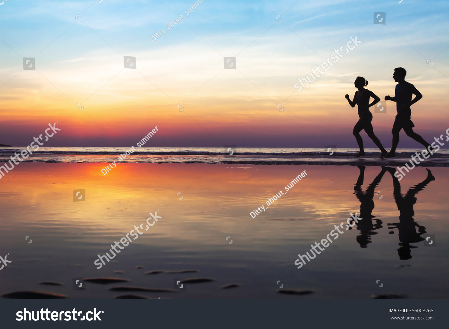 two runners on the beach, silhouette of people jogging at sunset, healthy lifestyle background with copyspace #356008268
