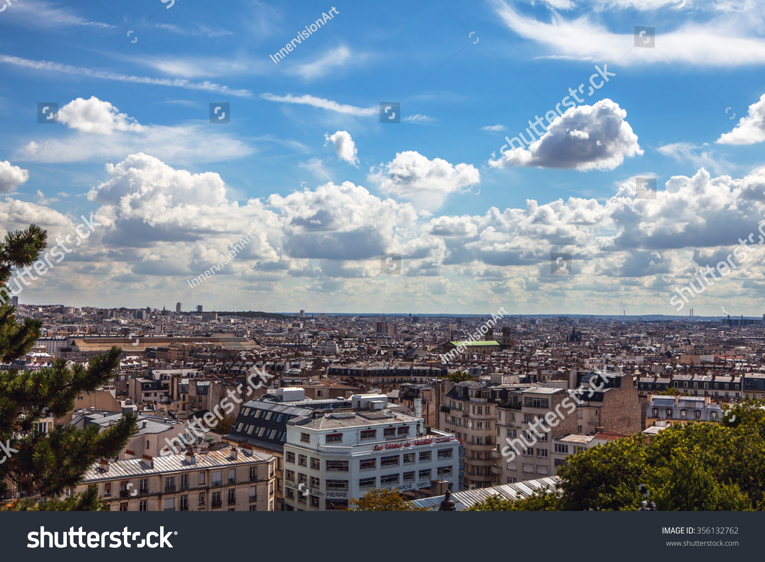 PARIS, FRANCE - AUGUST 30, 2015: View from Montmartre to summer Paris and beautiful blue sky with soft clouds. Paris, France. #356132762
