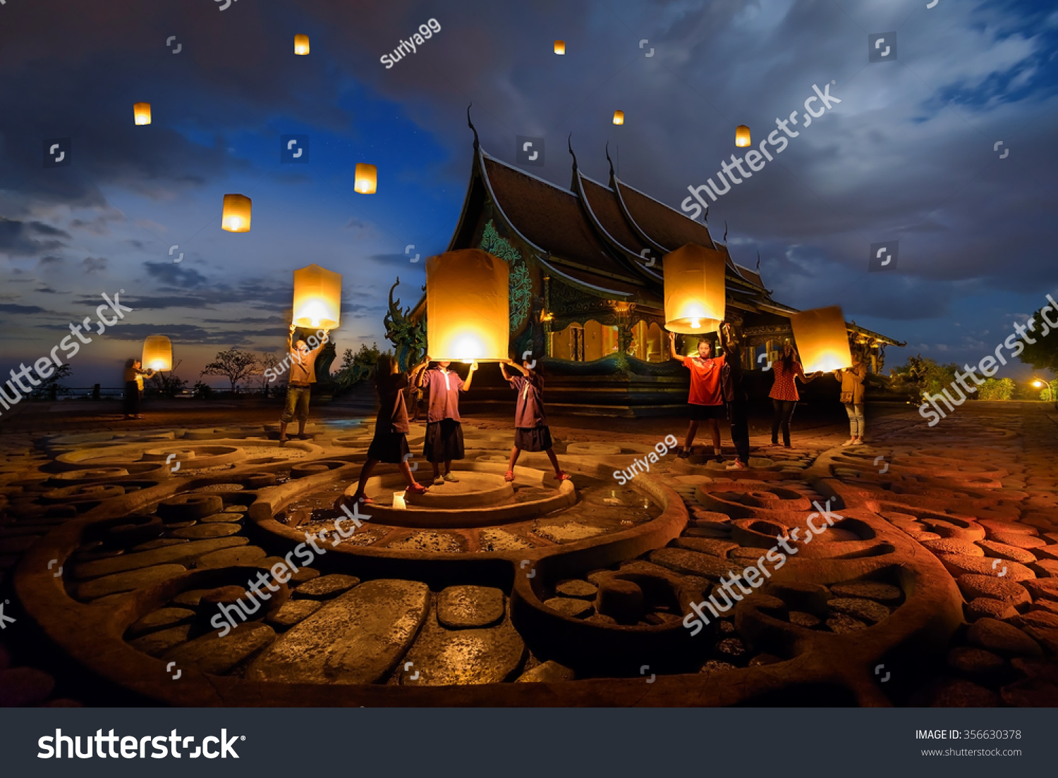 People floating lamp in yeepeng festival at pagoda tree glow temple  #356630378