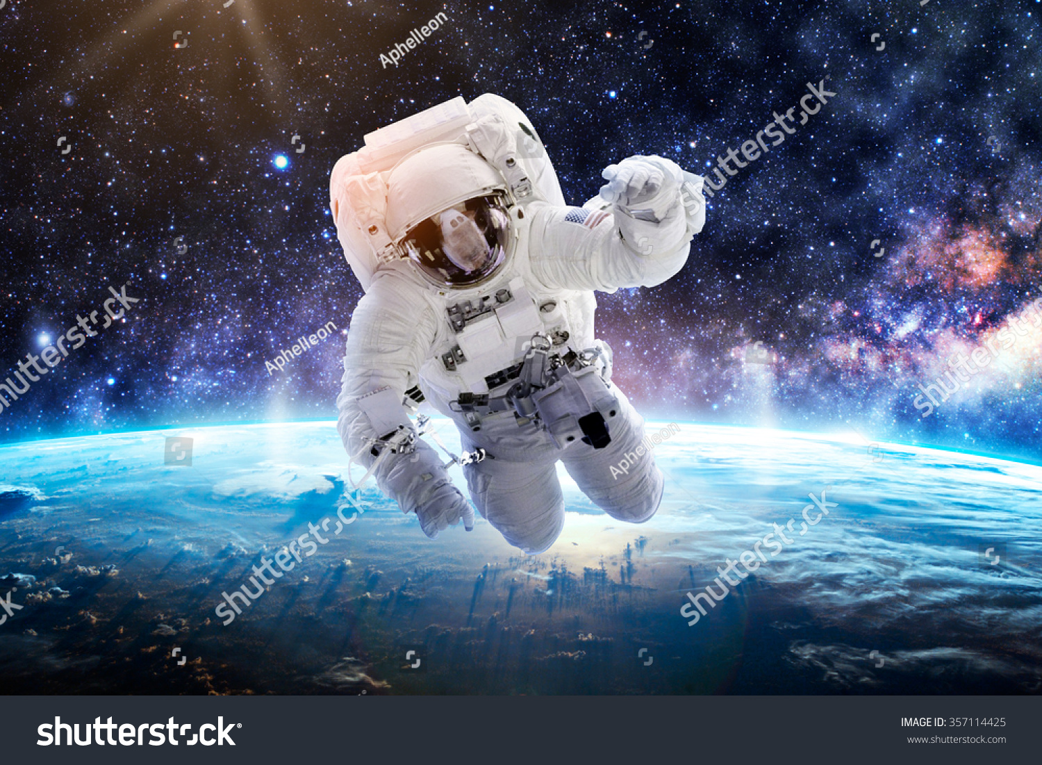 Astronaut Over Earth - Elements of this Image Furnished by NASA #357114425