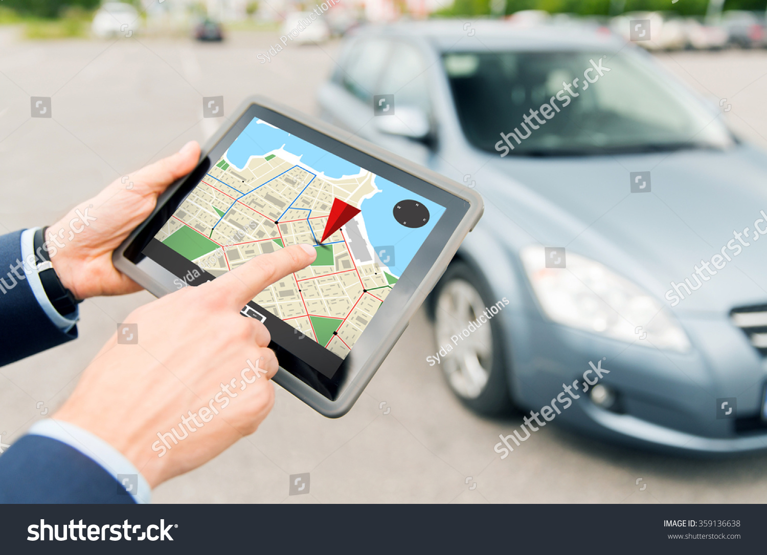 close up of hands with gps on tablet pc and car #359136638