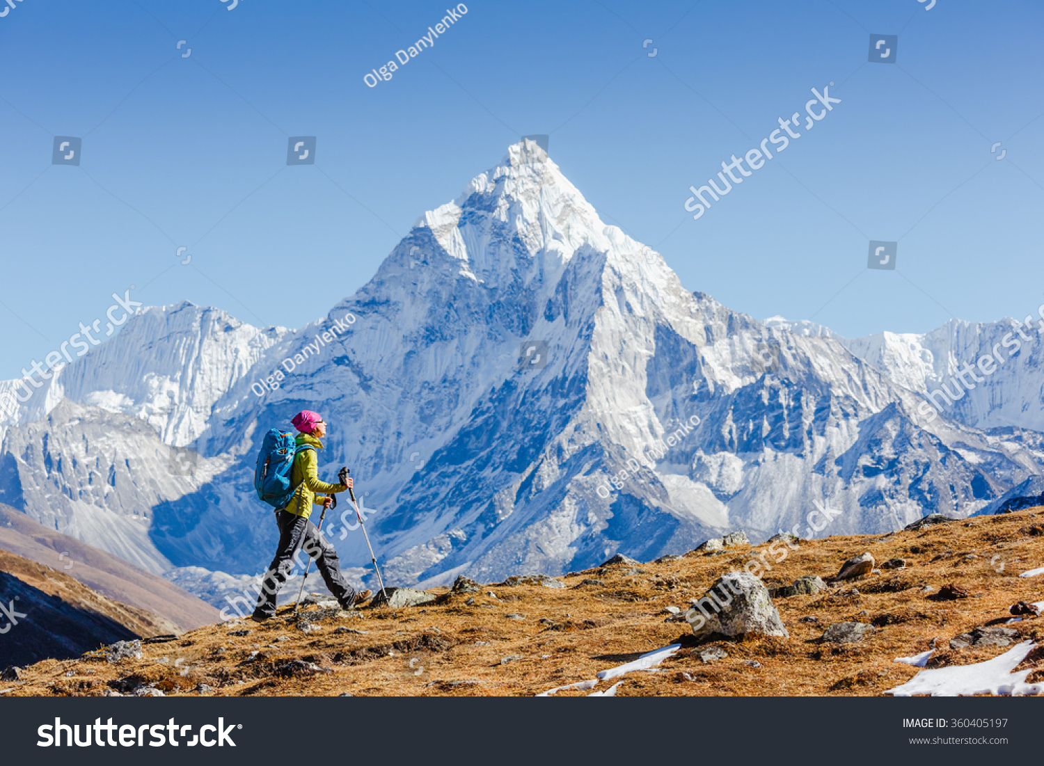 Happy hiker walking in the mountains, freedom and happiness, achievement in mountains. Himalayas, Everest Base Camp trek, Nepal #360405197