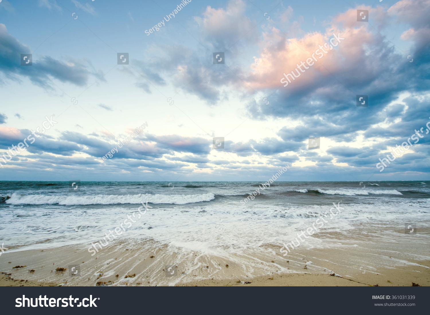   Beautiful sea landscape in early morning mist against the background of dramatic cloudy sky at sun rise time. Cuba coast. #361031339