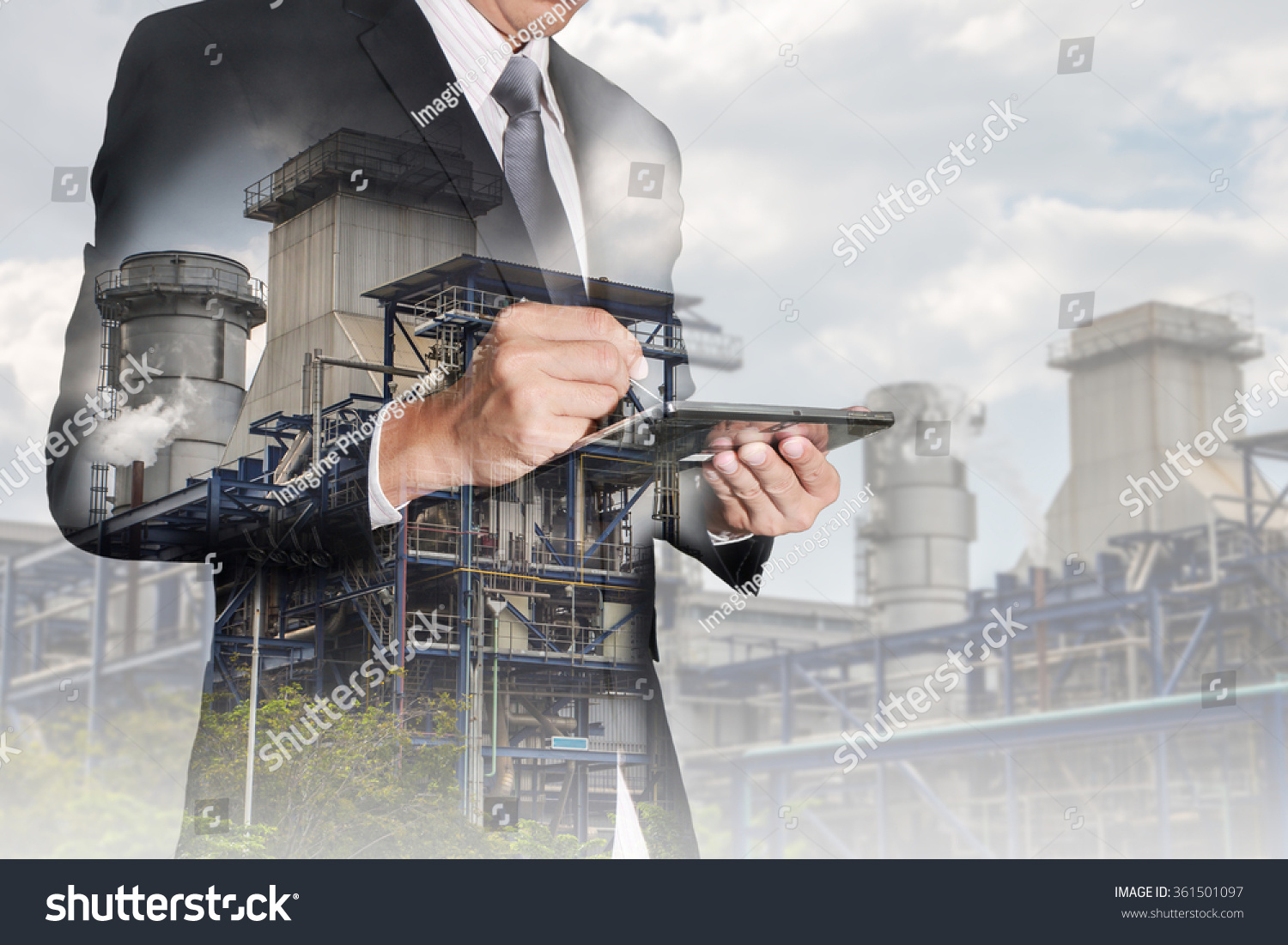 Double exposure of businessman working with tablet and  Electric Generating Factory, Power Reactor as energy, communication and technology concept. #361501097