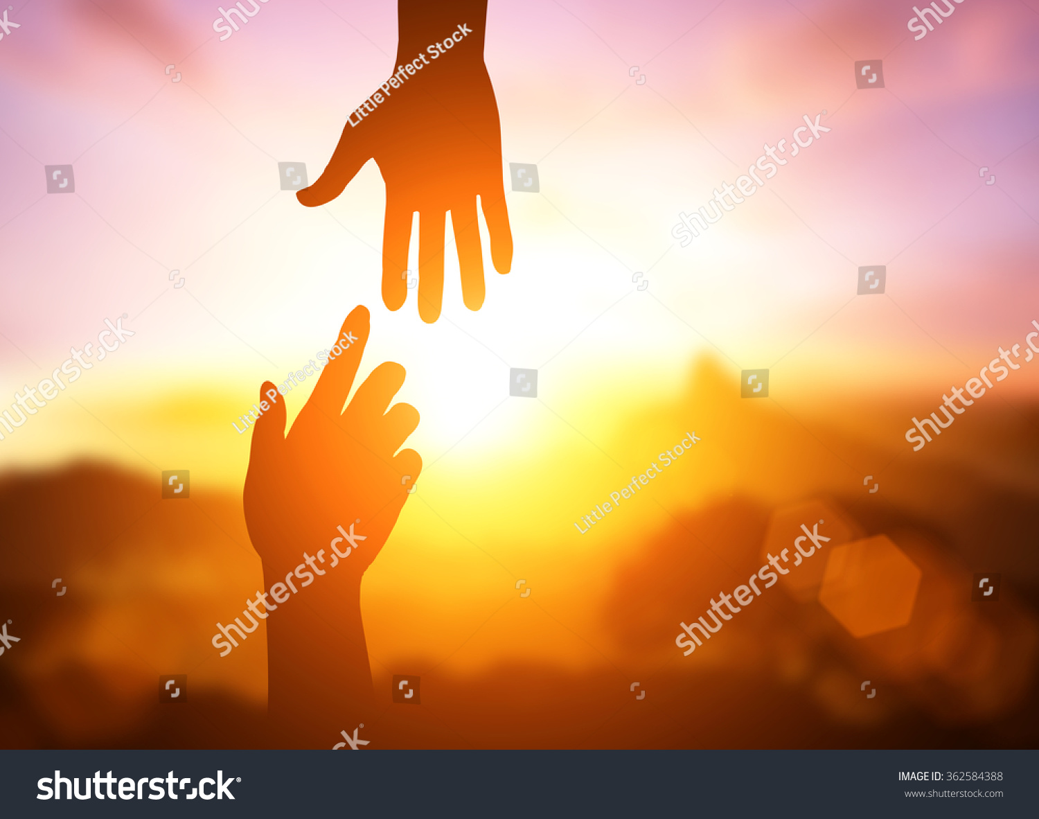 silhouette of helping hand concept and international day of peace.Thank You For Your Support. how can i help you. international day of peace.develop a friendship.please help me. #362584388