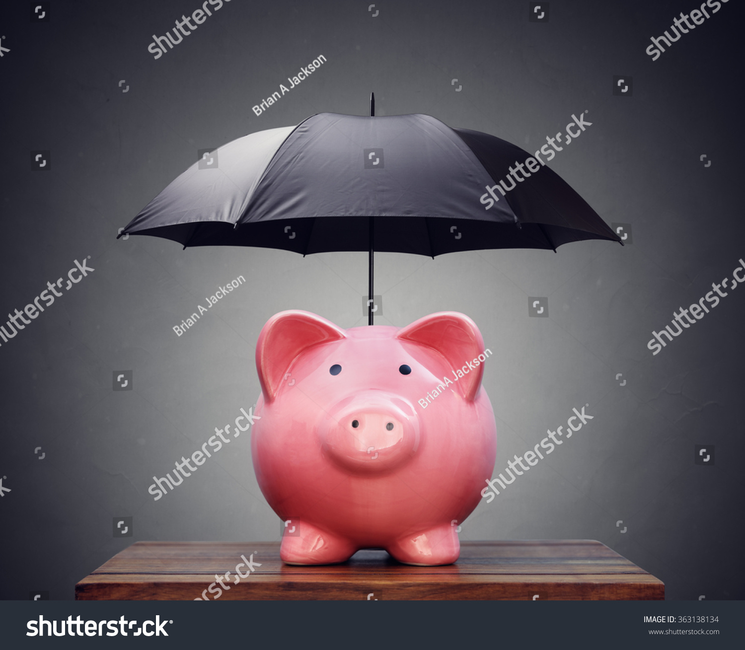 Piggy bank with umbrella concept for finance insurance, protection, safe investment or banking #363138134