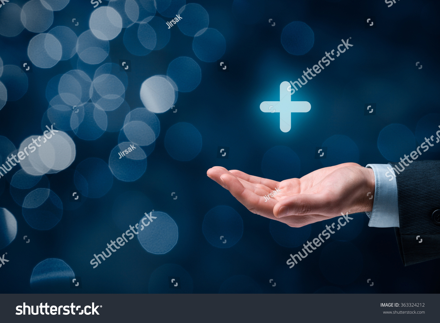 Businessman offer positive thing (like benefits, personal development, social networking) represented by plus sign, bokeh in background.
 #363324212
