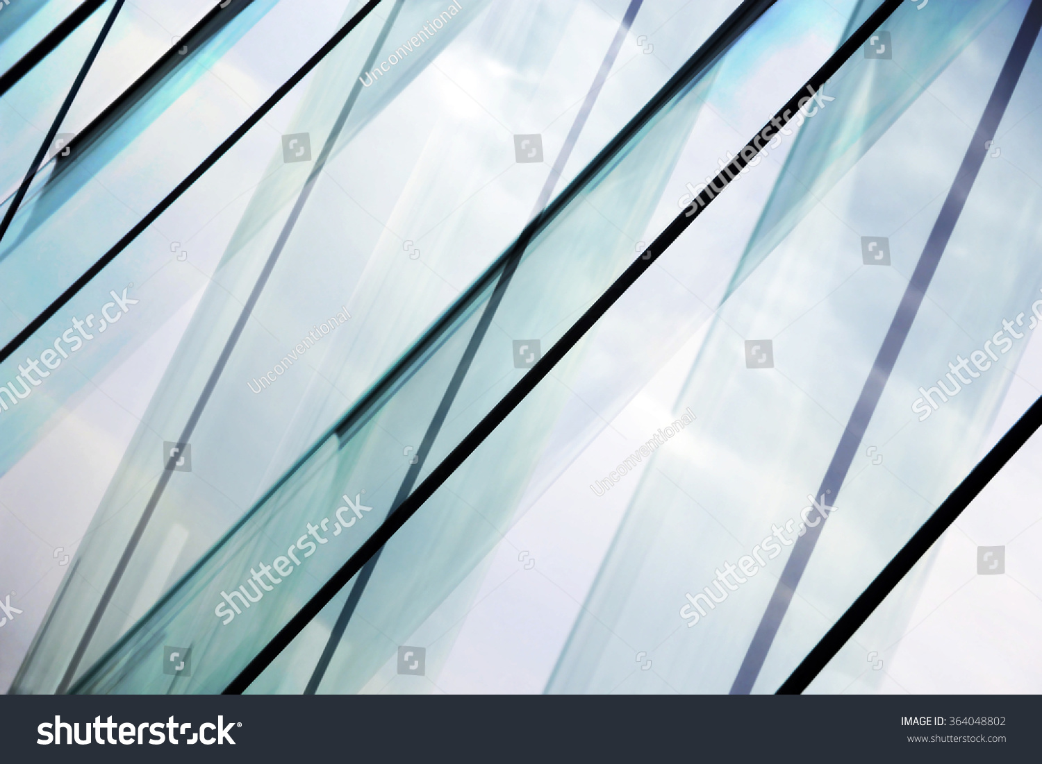 Glass architecture. Tilt double exposure photo of modern office building facade. Sample of dynamic business cityscape. Abstract high-technology composition with all-over glazing. #364048802