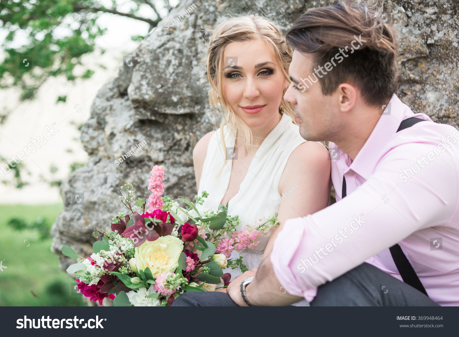 Portrait of the bride and groom outdoors #369948464