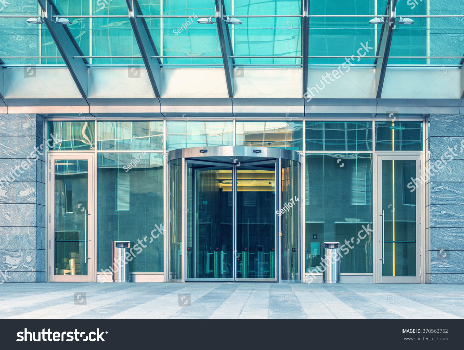 Entrance of the modern business city office building. #370563752