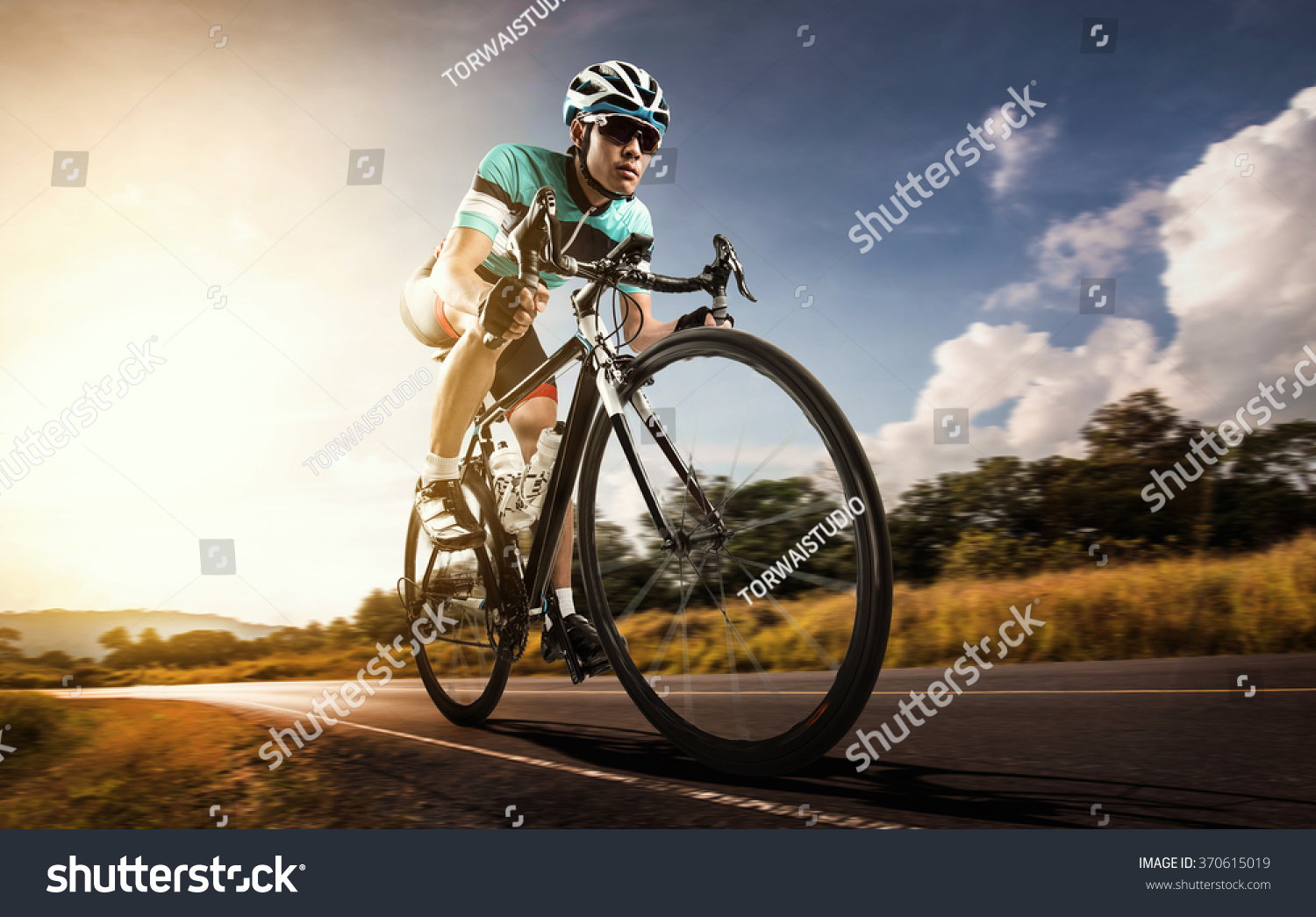 Asian men are cycling road bike in the morning #370615019