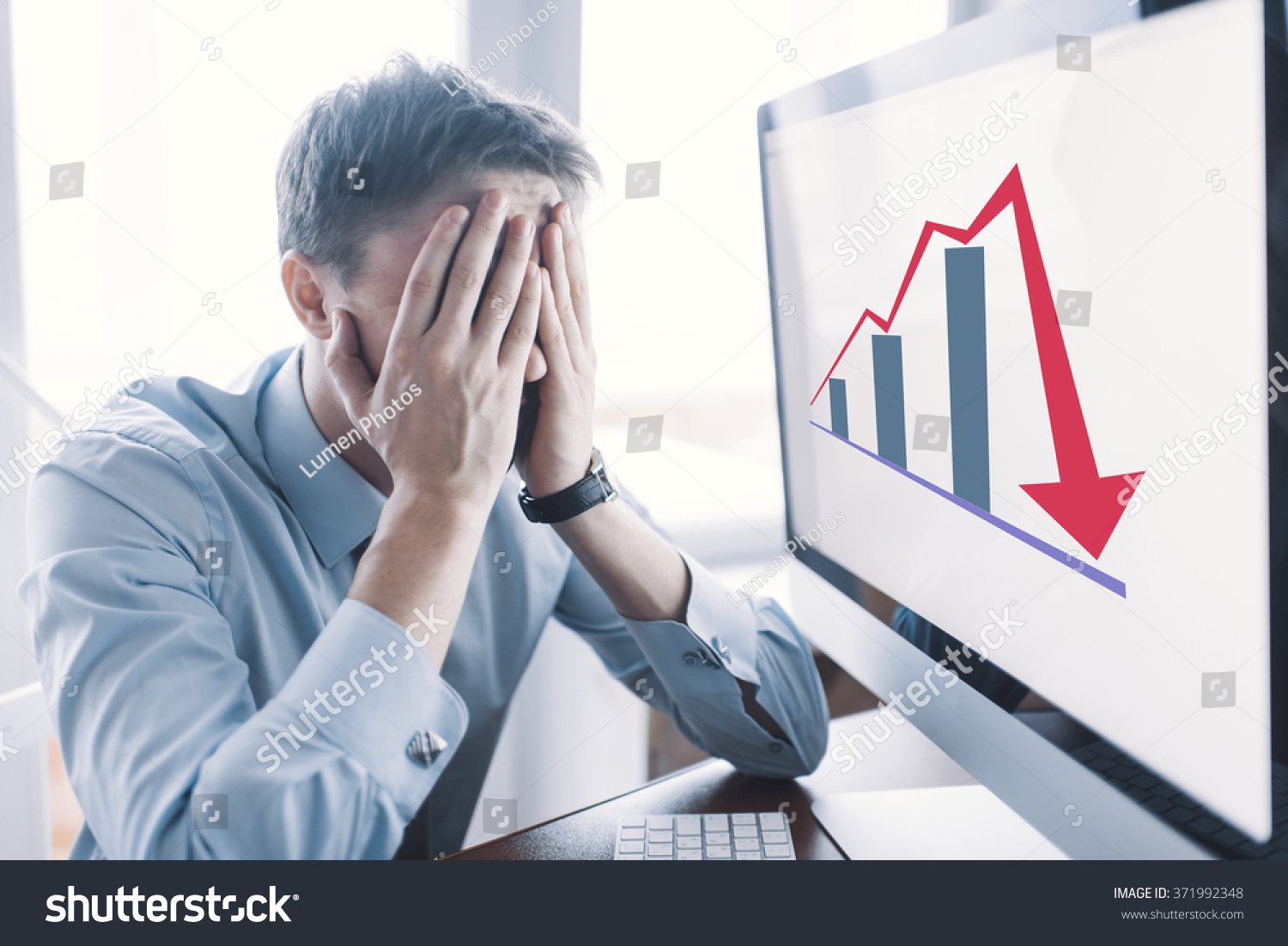Frustrated stressed shocked business man with financial market chart graphic going down on grey office wall background. Poor economy concept. Face expression, emotion, reaction #371992348