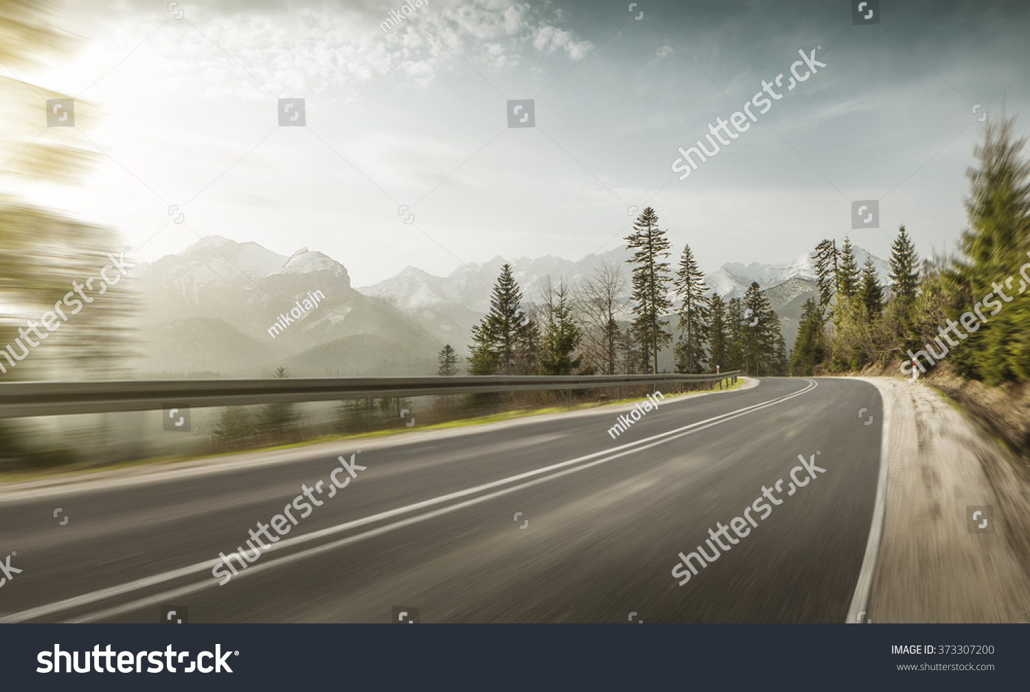 Mountain road at hight speed drive downhill #373307200