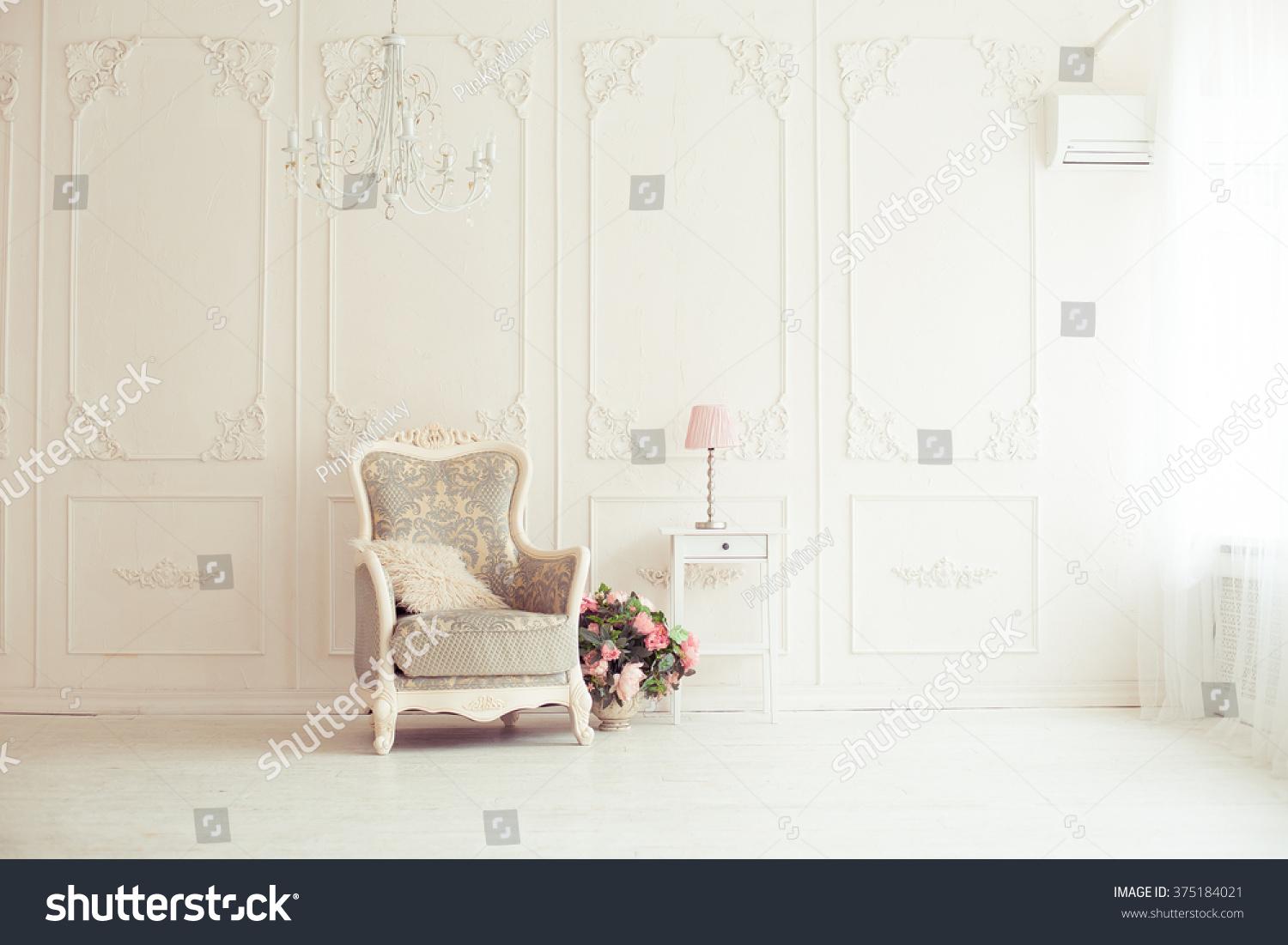 elegant armchair in luxury clean bright white interior #375184021