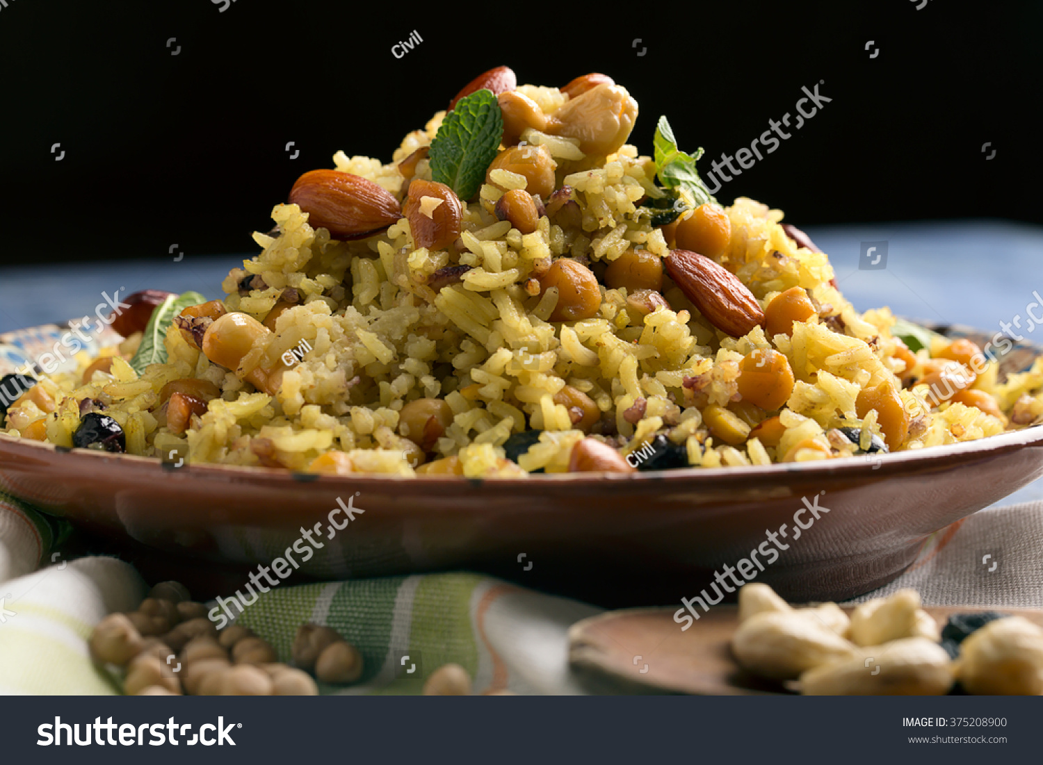 Traditional Middle Eastern or Indian dish of rice (pilaf) cooked with spices #375208900