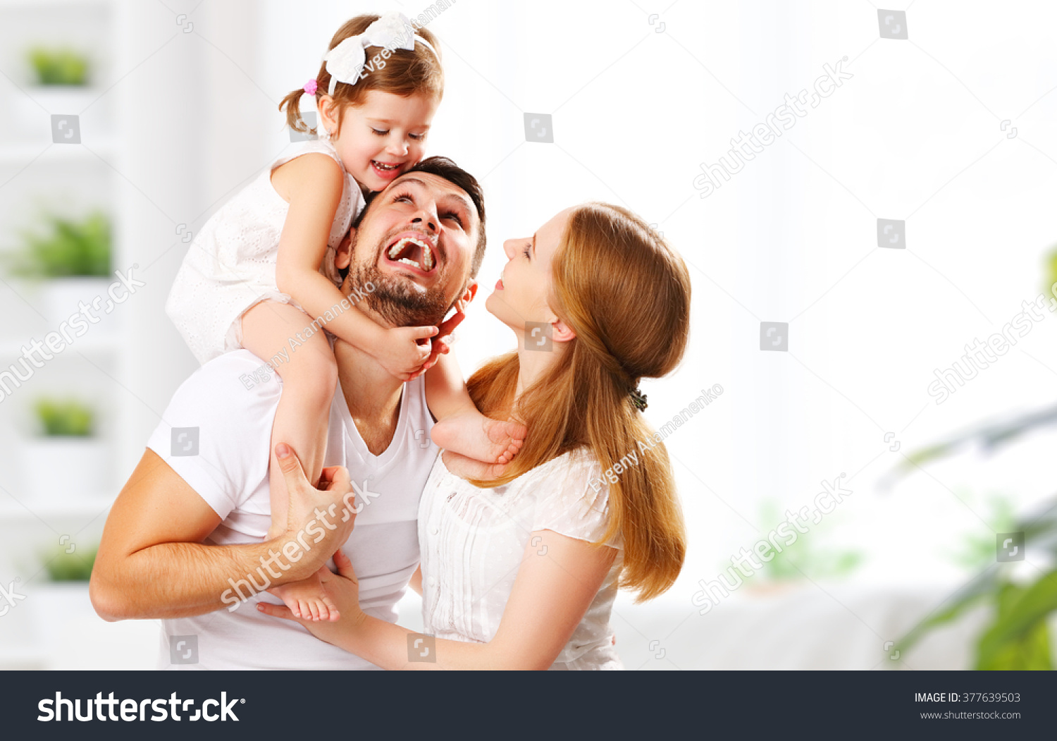 happy family mother, father,  child daughter at home #377639503