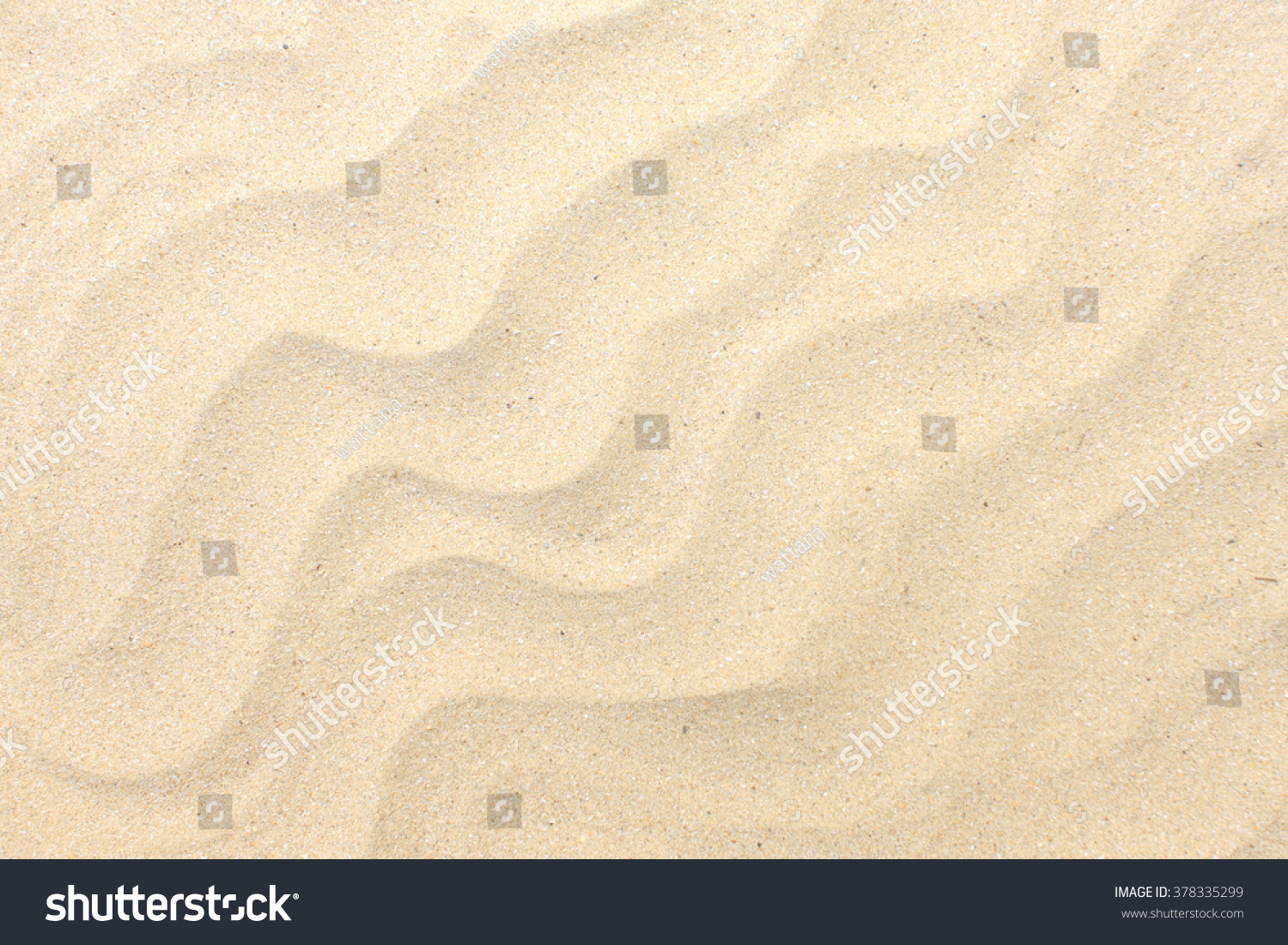 Sand texture. Sandy beach for background. Top view #378335299