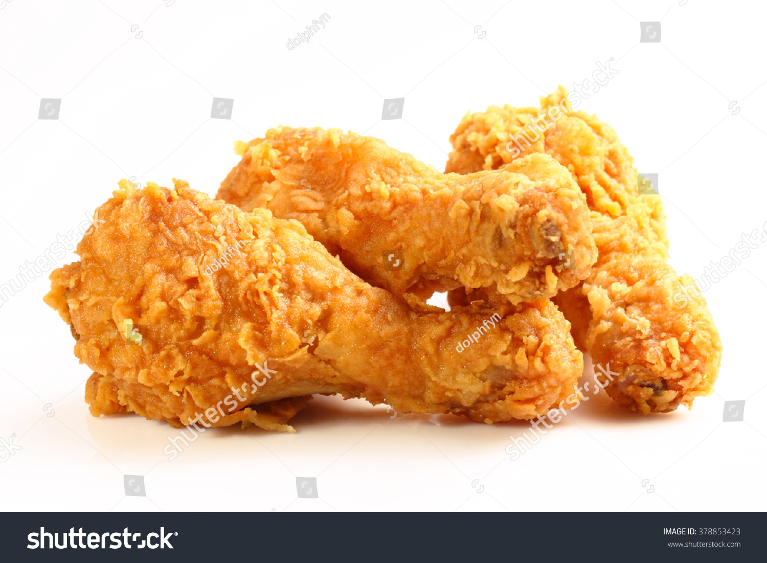 hot and crispy fried chicken legs isolated on a white background #378853423