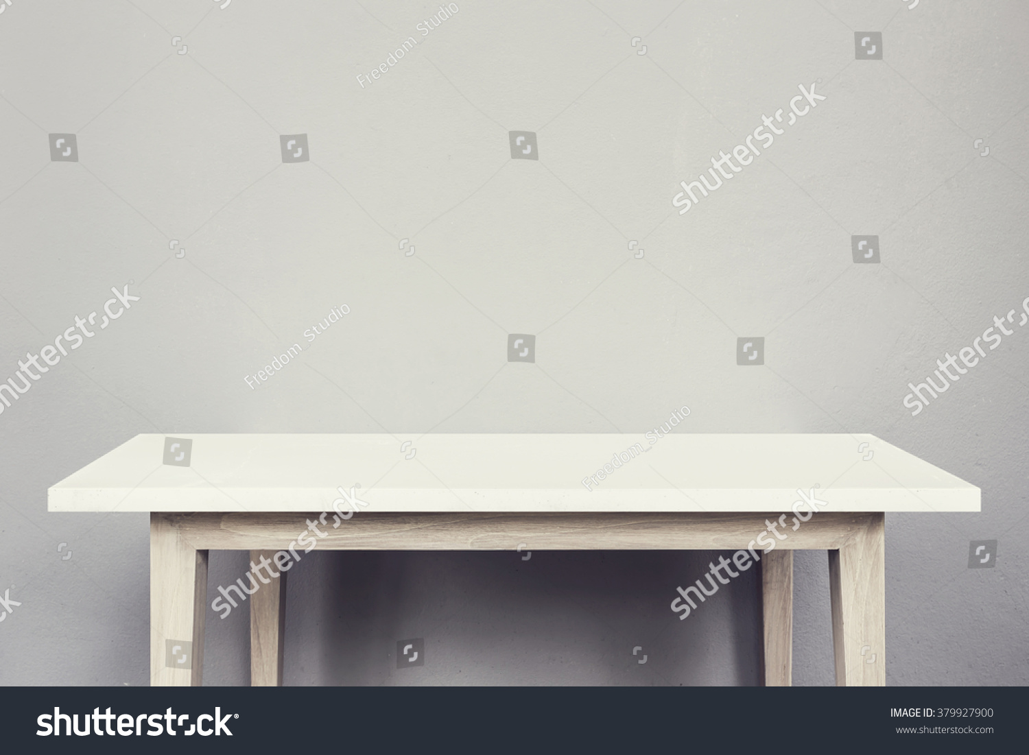 Empty top of natural stone table and grey wall background. For product display  #379927900
